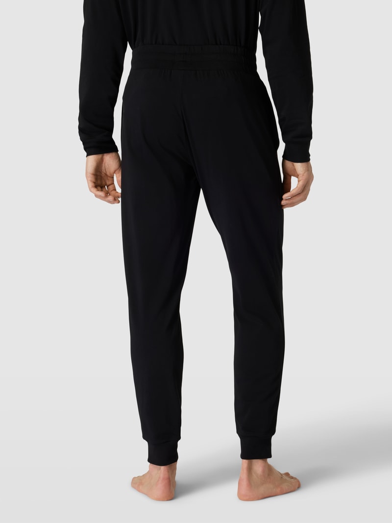 Sweatpants in unifarbenem Design mit elastischem Bund in schwarz