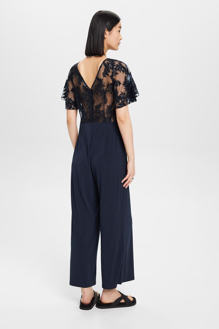 Jersey-Jumpsuit mit Blumenstickerei am Oberteil