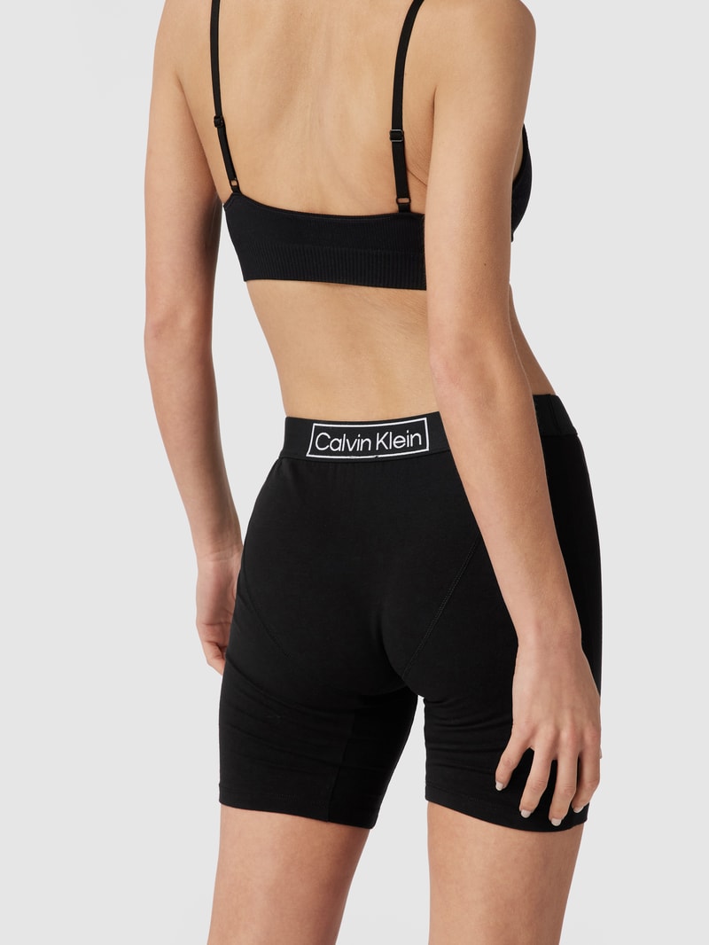 Pyjama-Hose mit Label-Schriftzug in schwarz