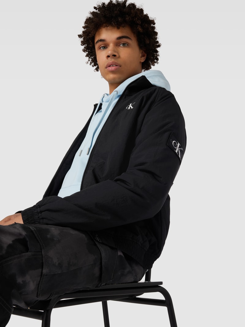 Blouson mit Logo-Print und Eingrifftaschen in black