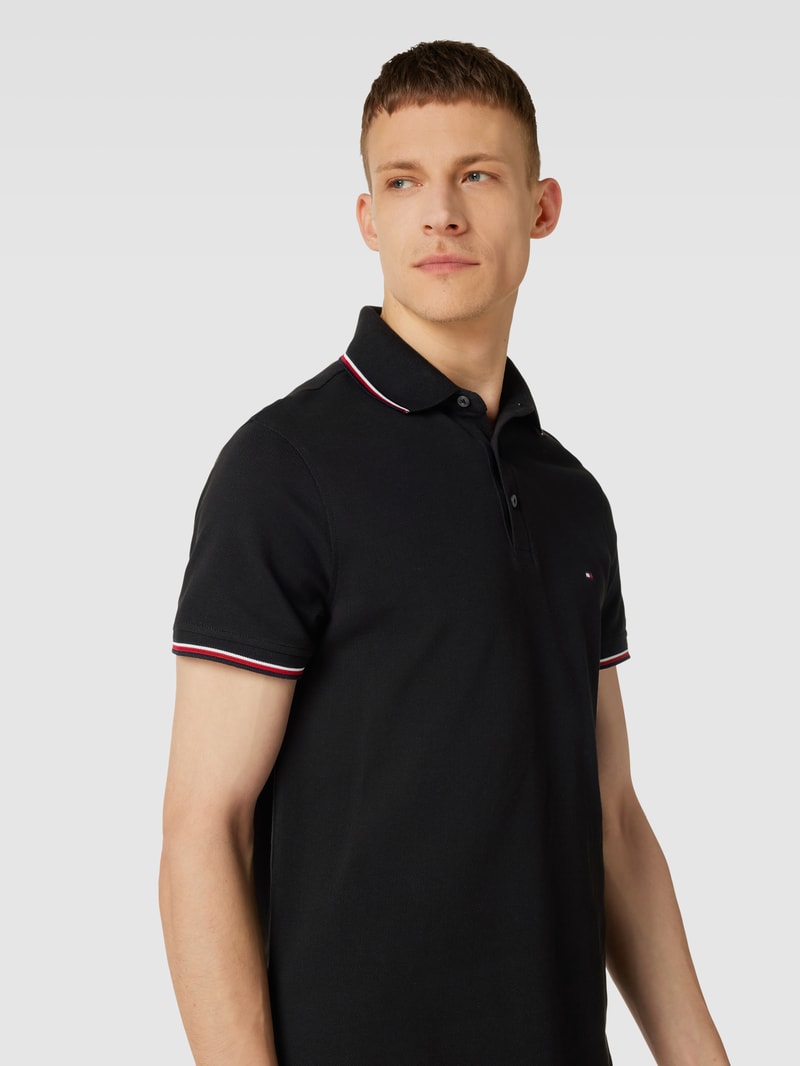 Poloshirt mit Kontraststreifen in schwarz