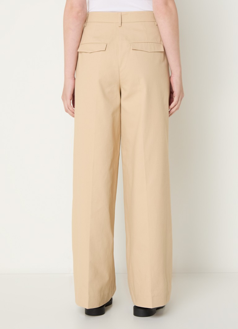 Pantaloni chino de damă Iben, cu talie înaltă, lejeri pe picioare și buzunare laterale.