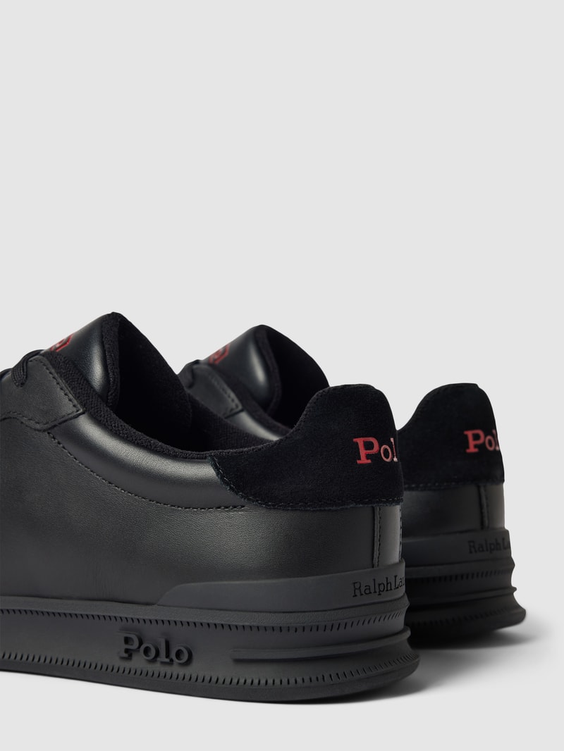 Sneaker mit Label-Details in schwarz