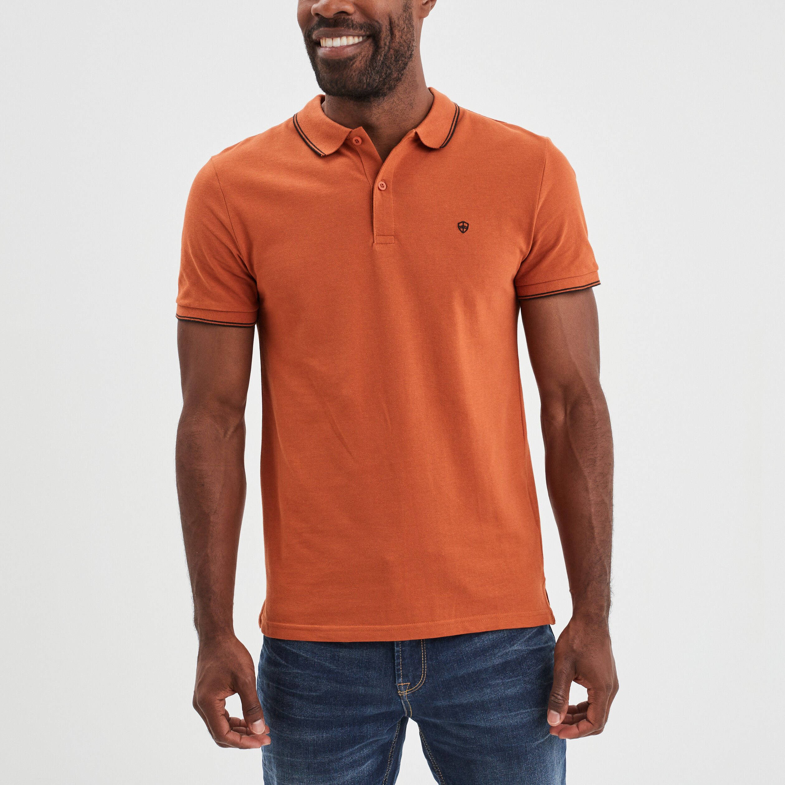 Polo manches courtes bords contrastés orange foncé homme | La Halle