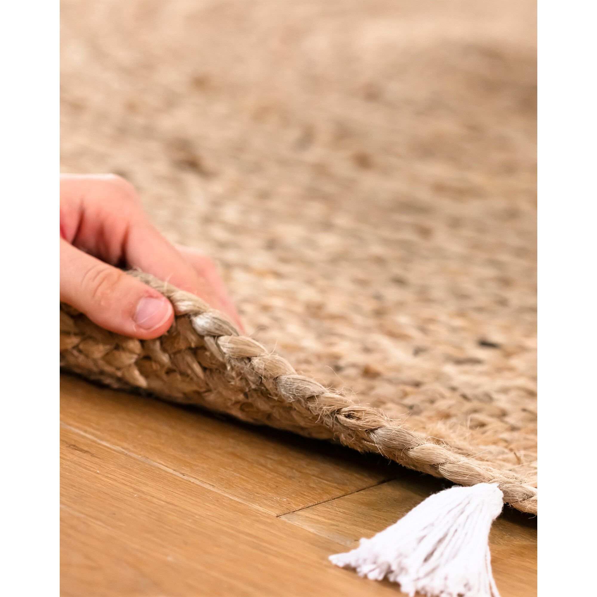 Tapis rond en jute avec pompons de couleur