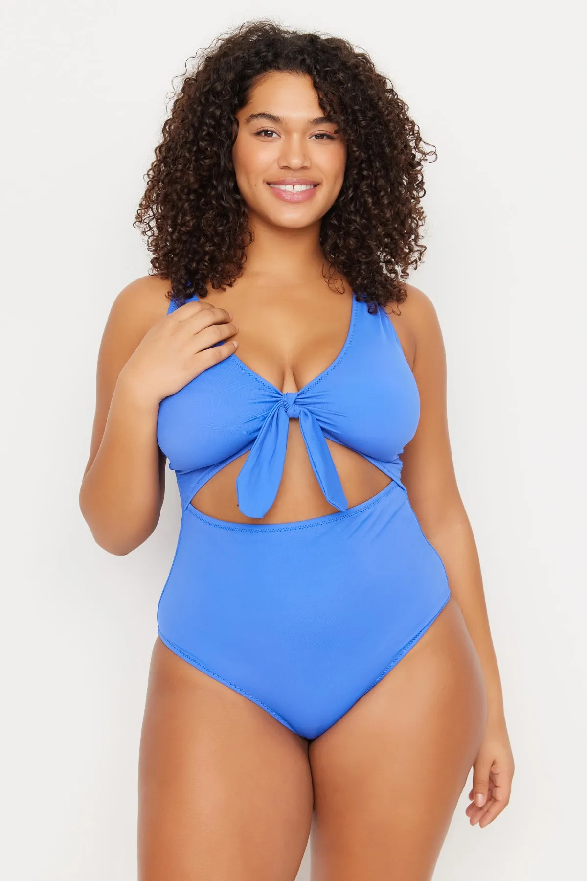 Trendyol Curve  Blauer Badeanzug mit tiefem V-Ausschnitt, Cut-Outs und Bindeband und überzogenem Recovery-Effekt TBBSS22MA0302