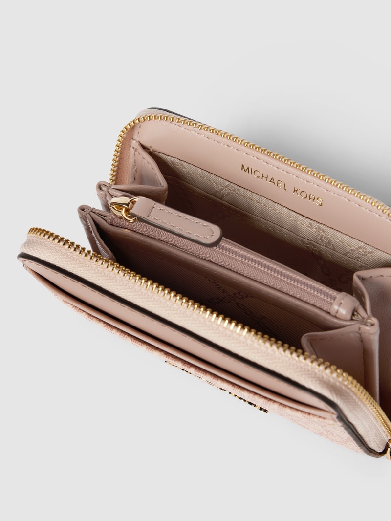 Portemonnaie mit Label-Applikation Modell 'JET SET CHARM' in rosé