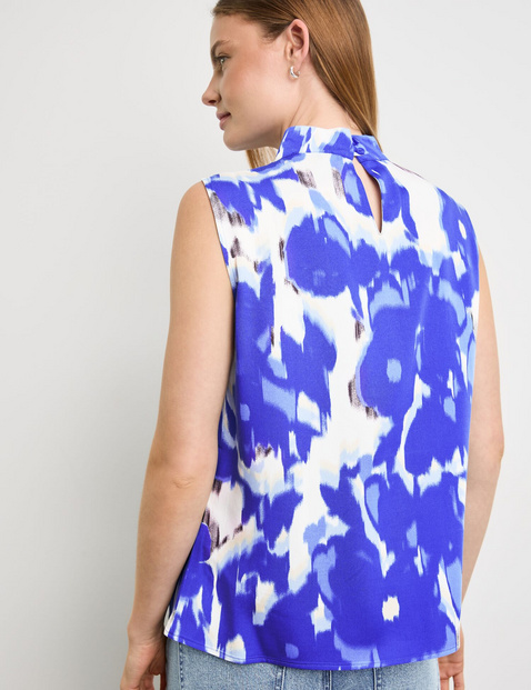 Ärmellose Bluse mit Alloverprint