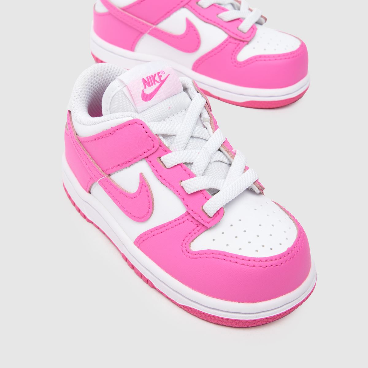 Belo-roza superge Nike Dunk Low za deklice z motivom malčka