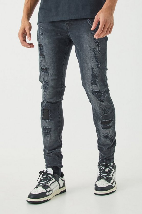 Schwarze Skinny Stretch Jeans mit Rissen