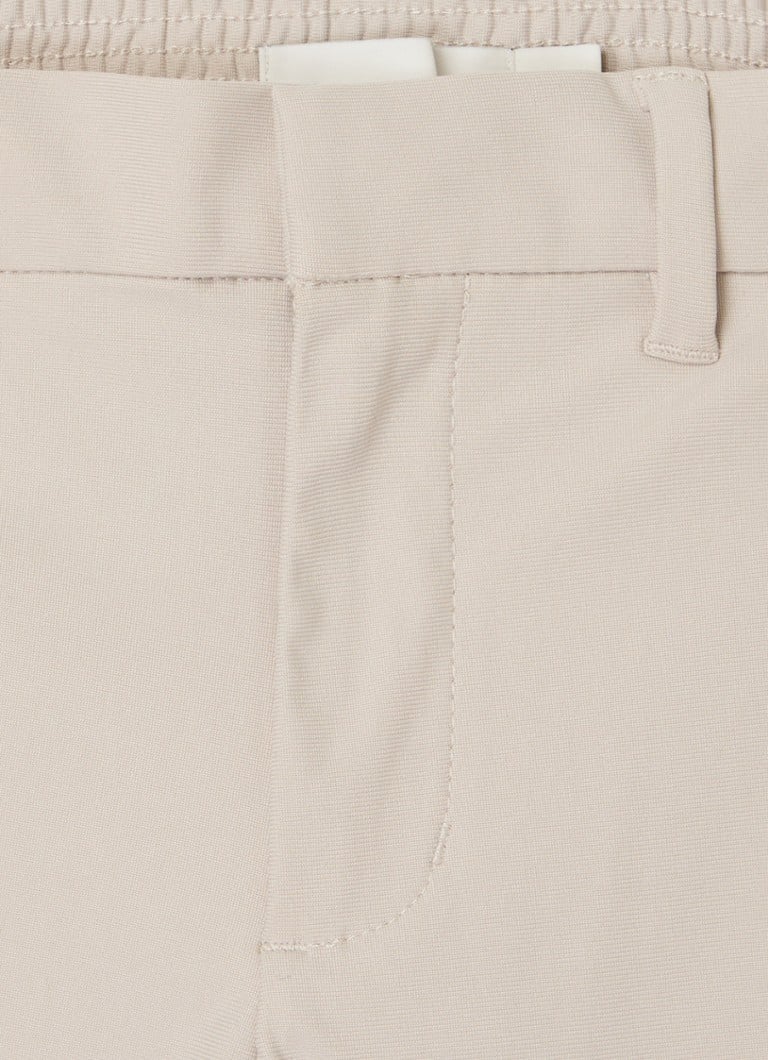 Spodnie Calvin Klein z szerokimi nogawkami i kieszeniami z klapkami