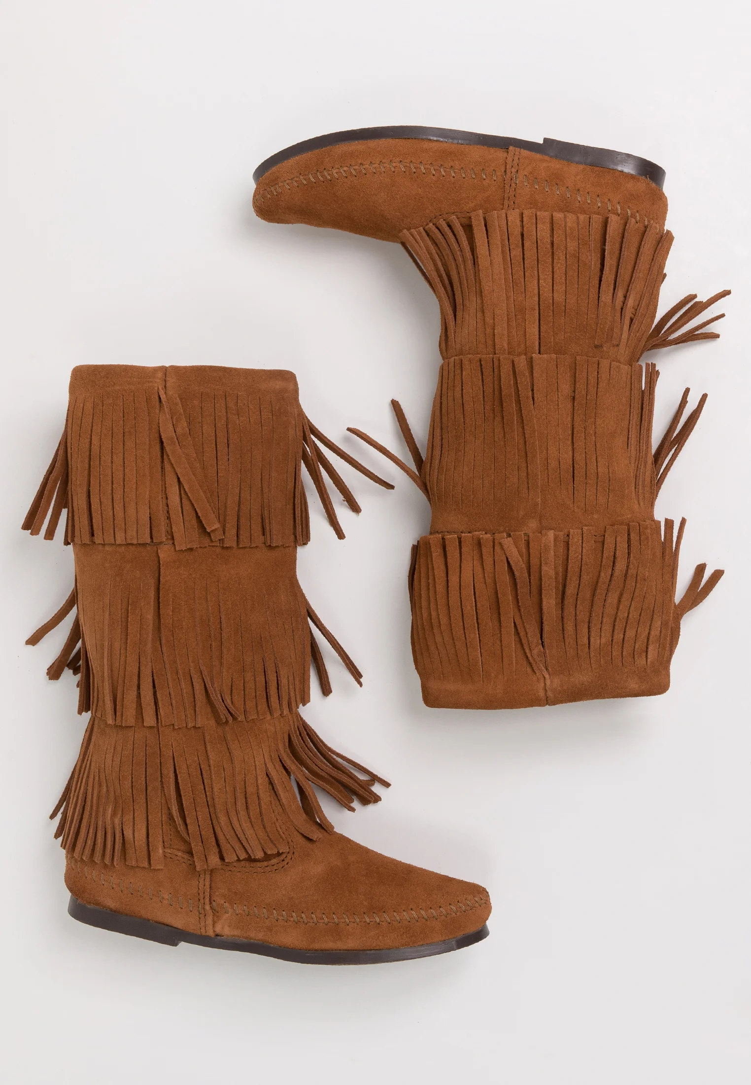 Botas altas Minnetonka de 3 capas con flecos