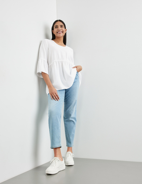 Ausgestellte Bluse mit Volants