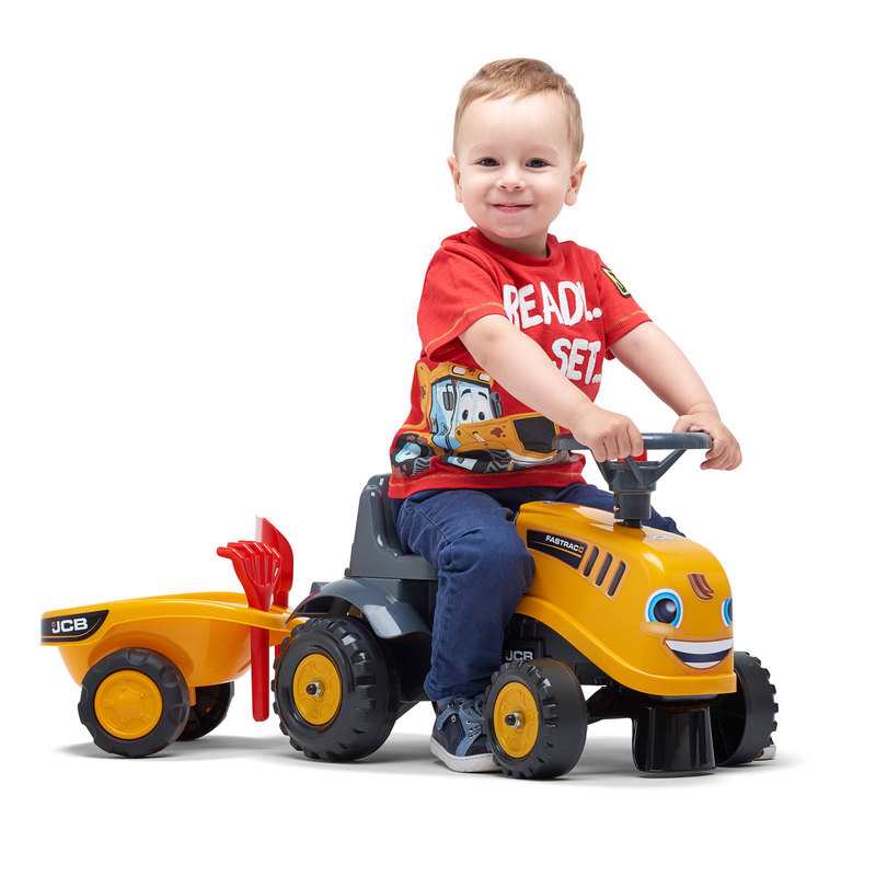 Porteur tracteur JCB avec remorque, pelle et rateau Falk