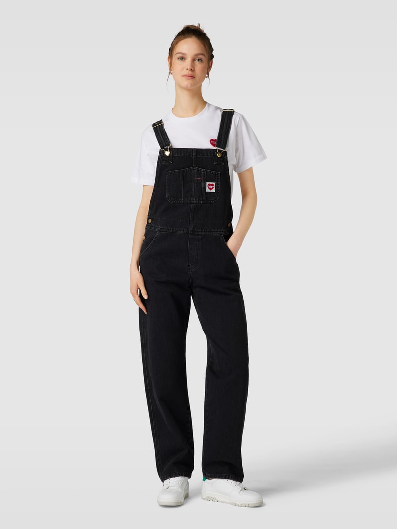 Latzhose mit Label-Patch in schwarz