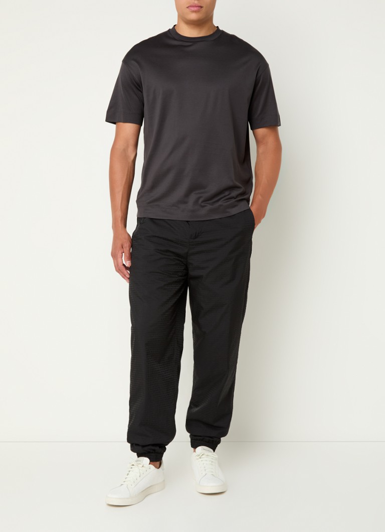 Pantaloni de trening Emporio Armani cu logo imprimat și buzunare laterale.
