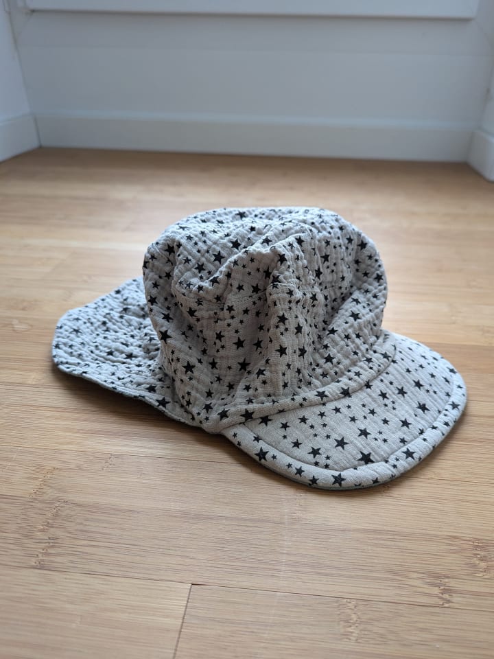 Sterntaler Wende-Nackenschutzcap in Grün - ungetragen! günstig kaufen 53 cm