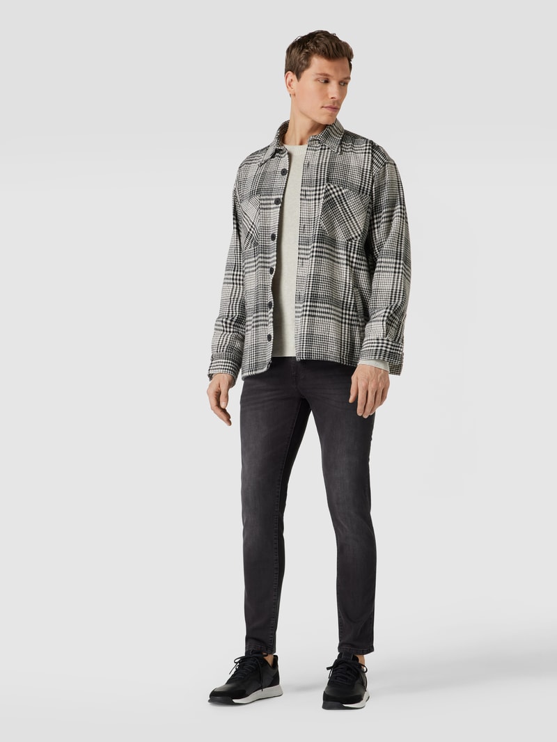 Skinny Fit Jeans mit Label-Patch in schwarz