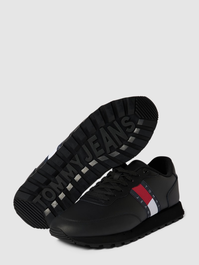 Sneaker mit Label-Details Modell 'TOMMY JEANS LEATHER RUNNE' in schwarz