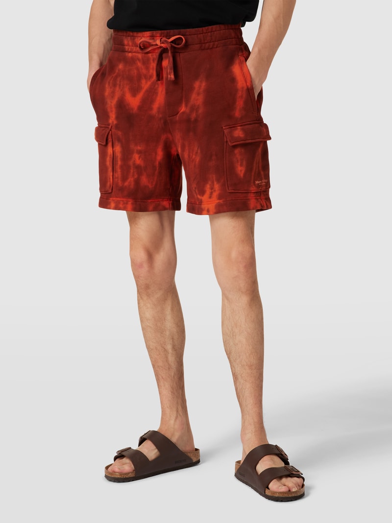 Sweatshorts mit Batik-Look in dunkel orange