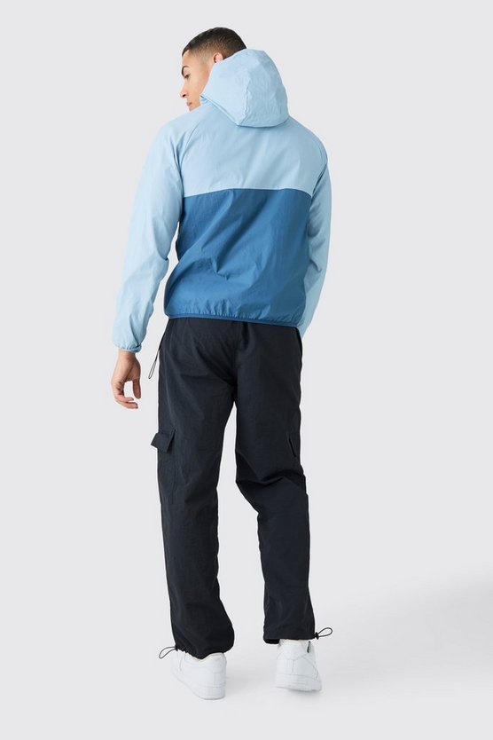 Colorblock Regenjacke mit Kapuze und halbem Reißverschluss