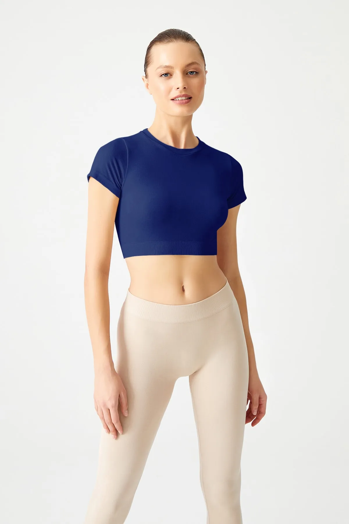 LOS OJOS  Marineblaues, nahtloses, weich strukturiertes Sport-T-Shirt-Crop-Top