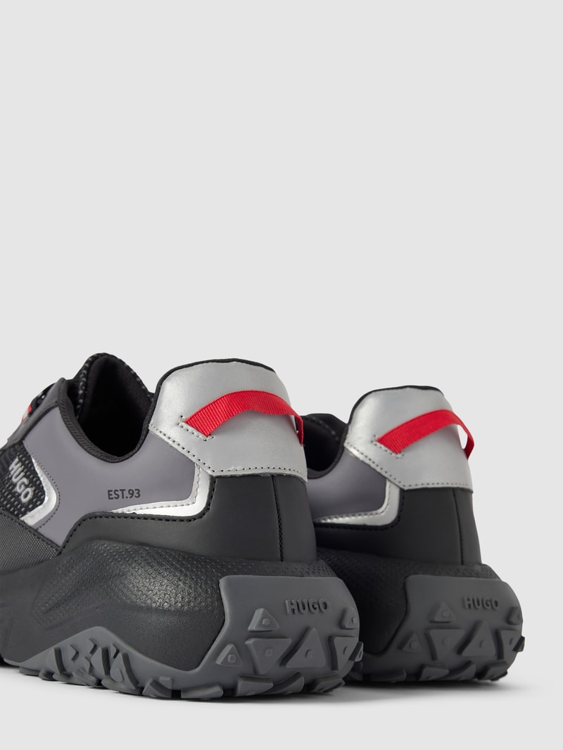 Sneaker mit Kontrastbesatz Modell 'pume' in schwarz