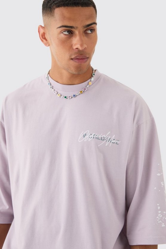 Oversize T-Shirt mit Graffiti-Print und Farbspritzern