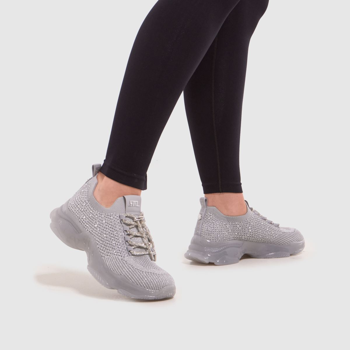 Steve Madden – Silverfärgade träningsskor med meter bling-motiv