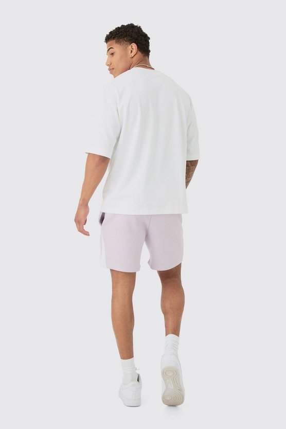 Oversize Shorts mit Graffiti-Print und Farbspritzern
