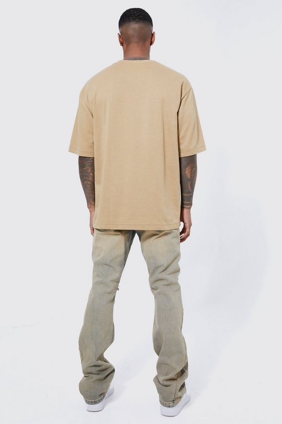 Slim-Fit Schlagjeans mit Rissen