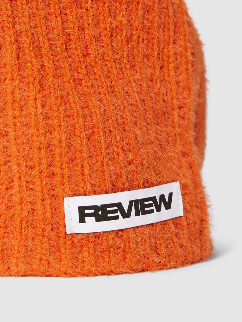 Sturmhaube mit Label-Detail in orange