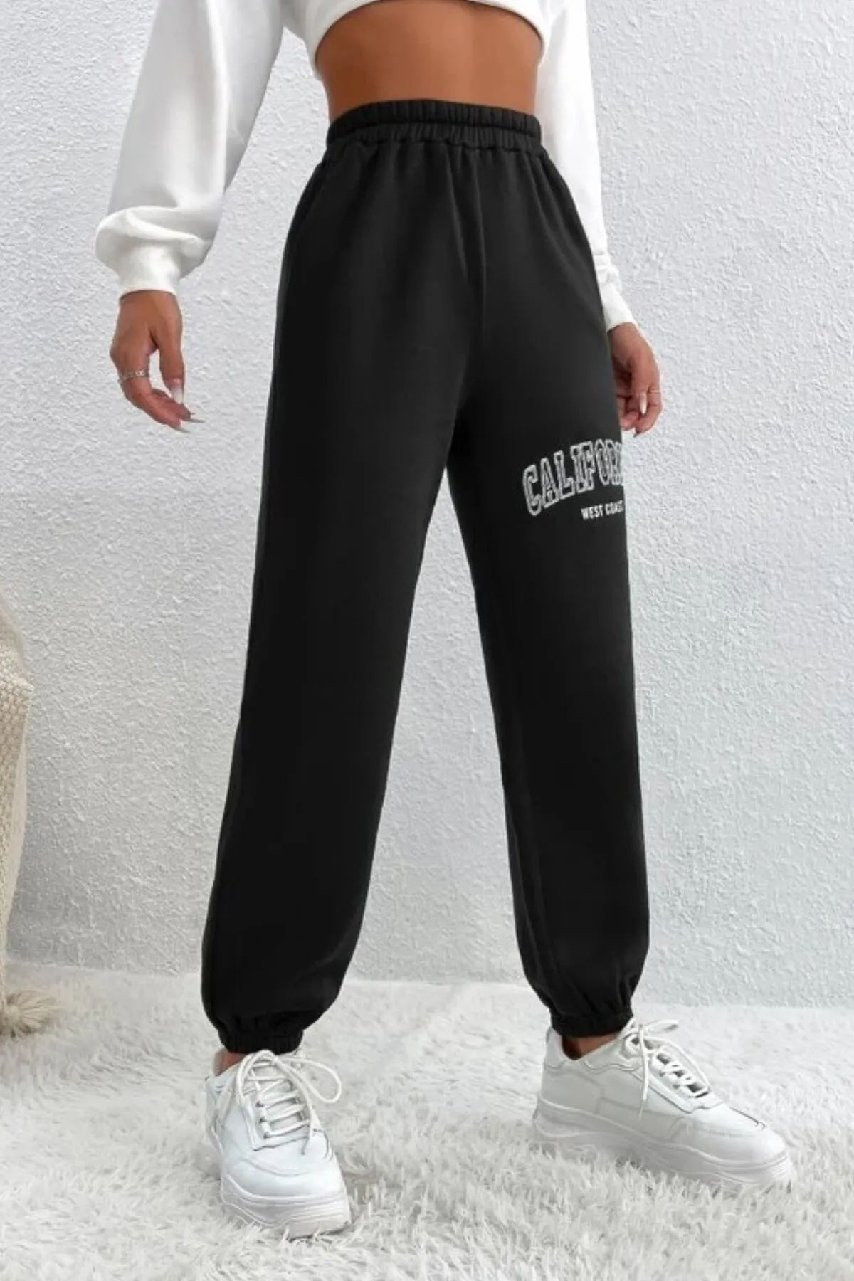 MODAGEN  Schwarze Unisex-Jogginghose in Übergröße mit California-Print und elastischen Beinen