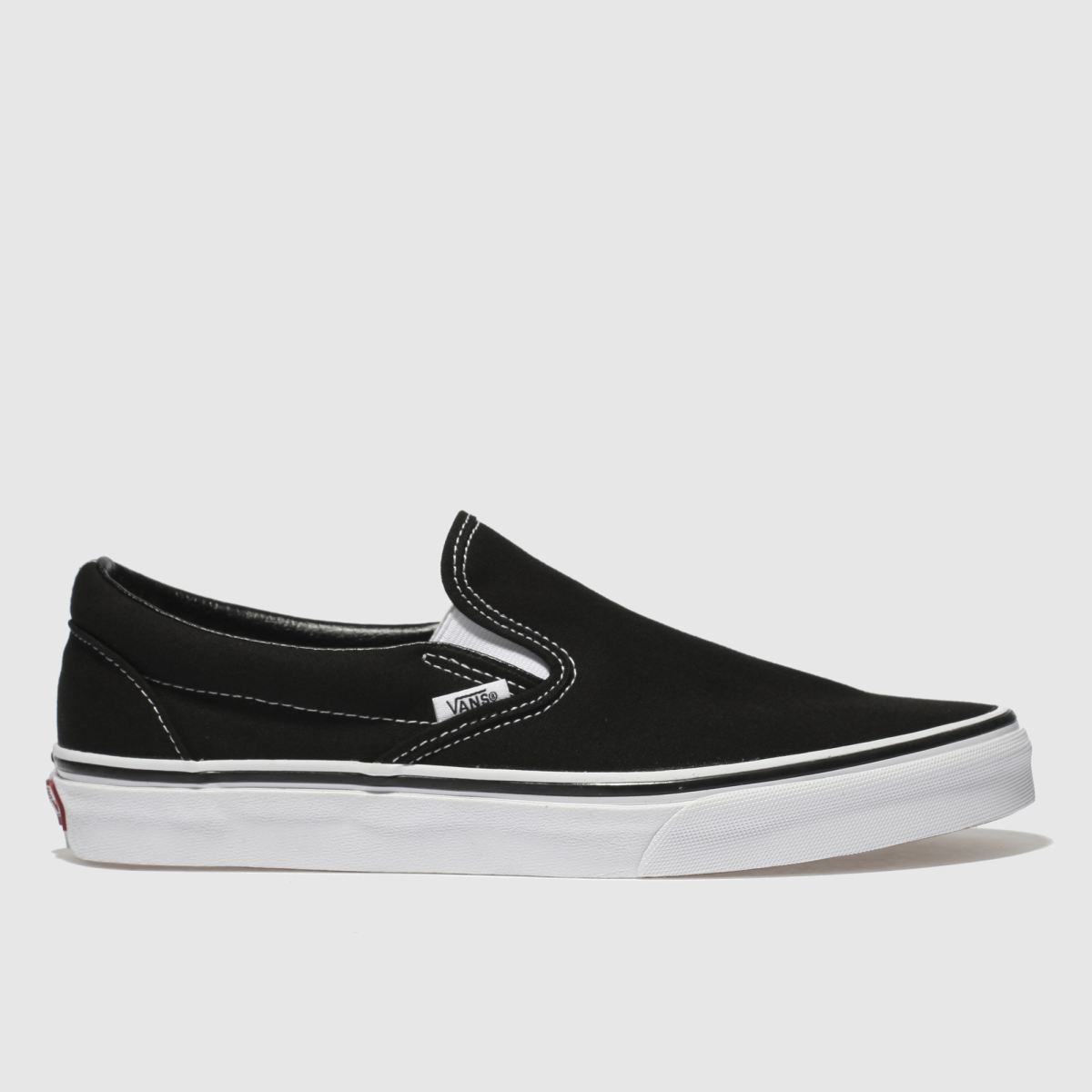 Vans klassiska slip-on-sneakers i svart och vitt