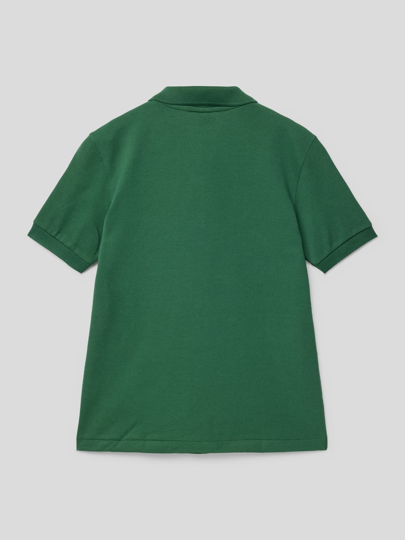 Poloshirt mit Label-Applikation in grün