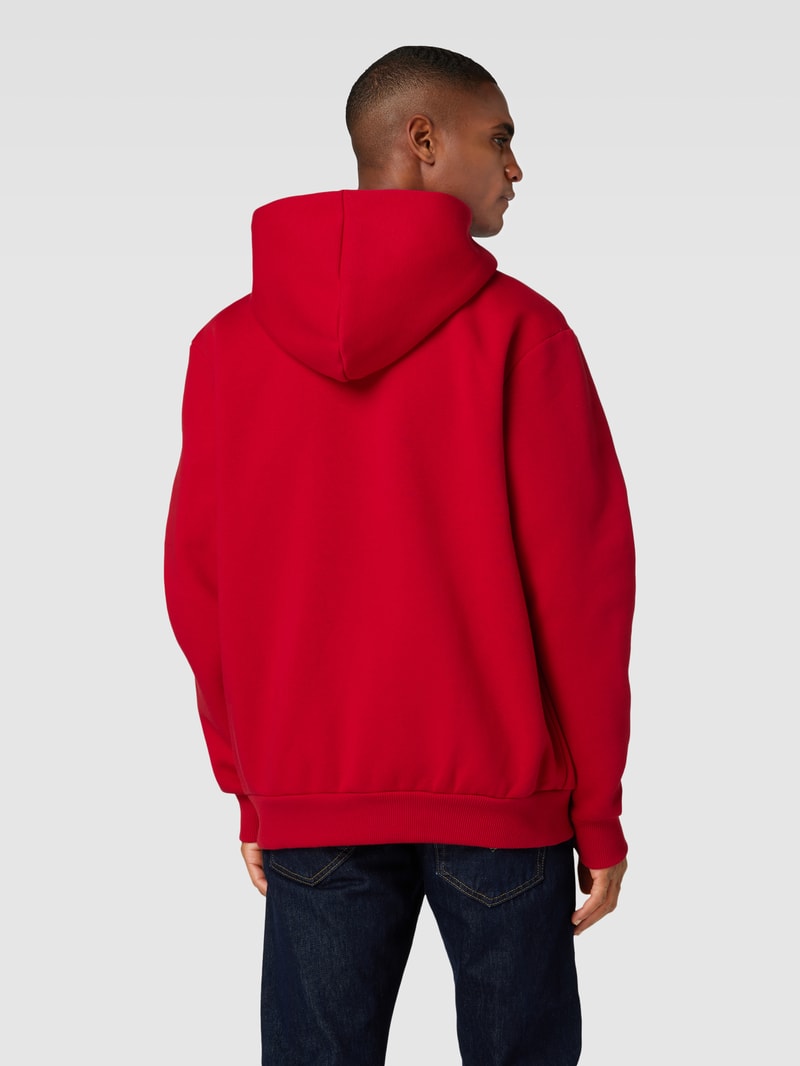 Sweatjacke mit Kapuze in kirschrot