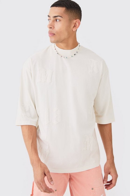 Oversize T-Shirt mit Acid-Waschung und Applikation