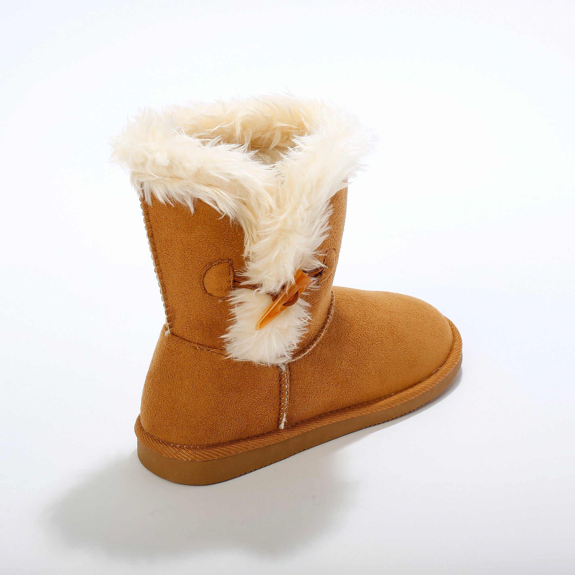 Bottes fourrées col effet peau de mouton et bouton corne