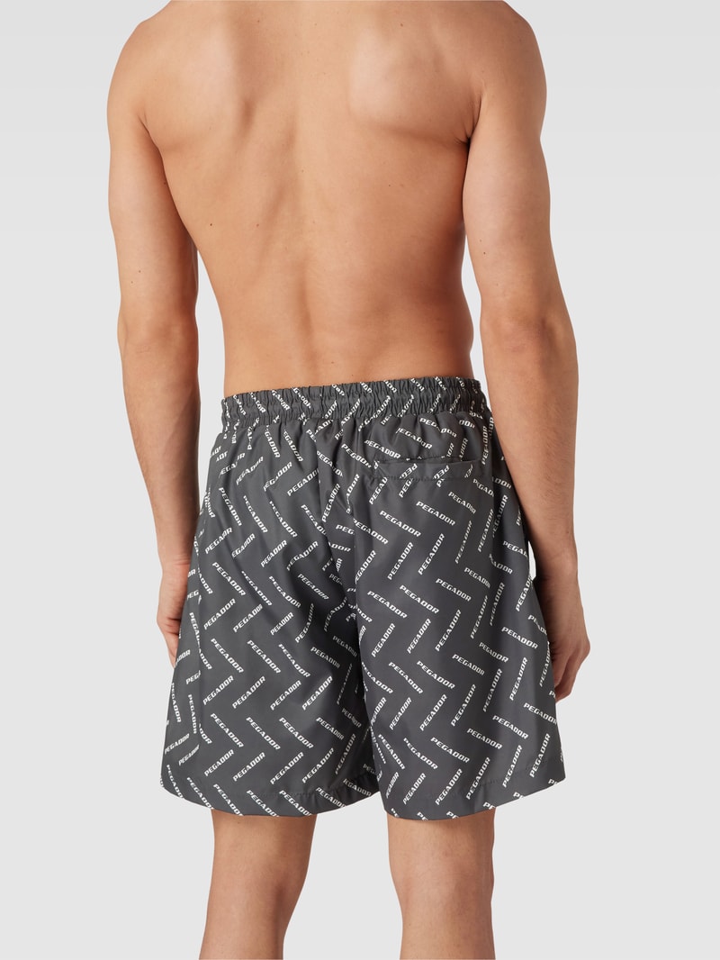 Badehose mit Label-Print Modell 'Kermint' in schwarz