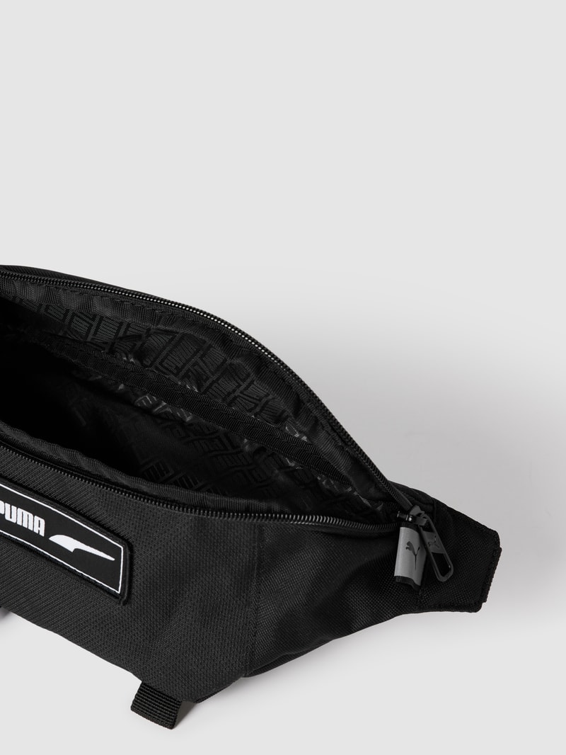 Bauchtasche mit Label-Detail Modell 'PUMA Deck Waist Bag' in schwarz