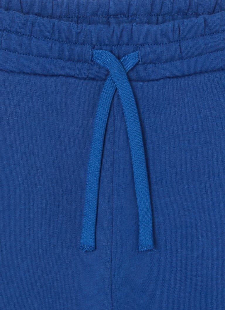 Pantaloni de trening Benetton cu croială conică pe picioare și buzunare aplicate.