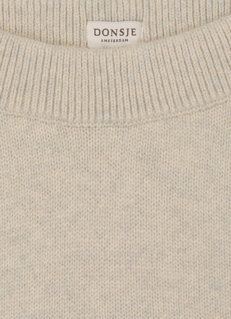 Pantaloni pentru copii Donsje Amsterdam Trig din lână merinos cu croială conică.