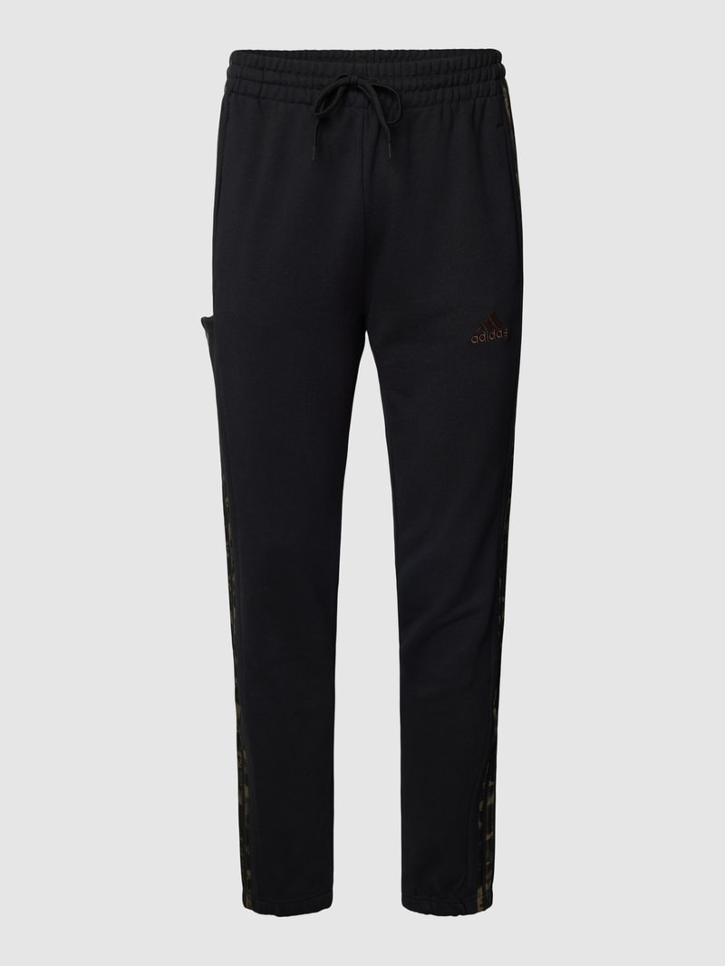 Jogpants mit elastischem Bund und Tunnelzug in schwarz