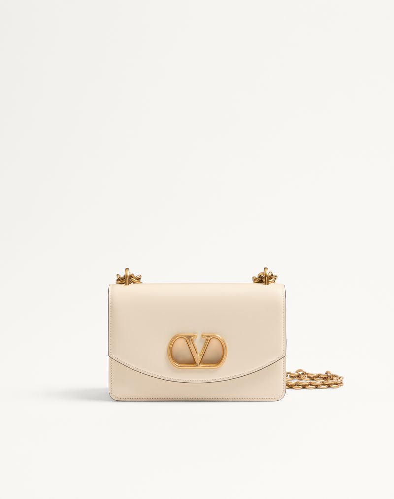 Bolsa de ombro pequena Valentino Garavani Vain em couro de bezerro brilhante