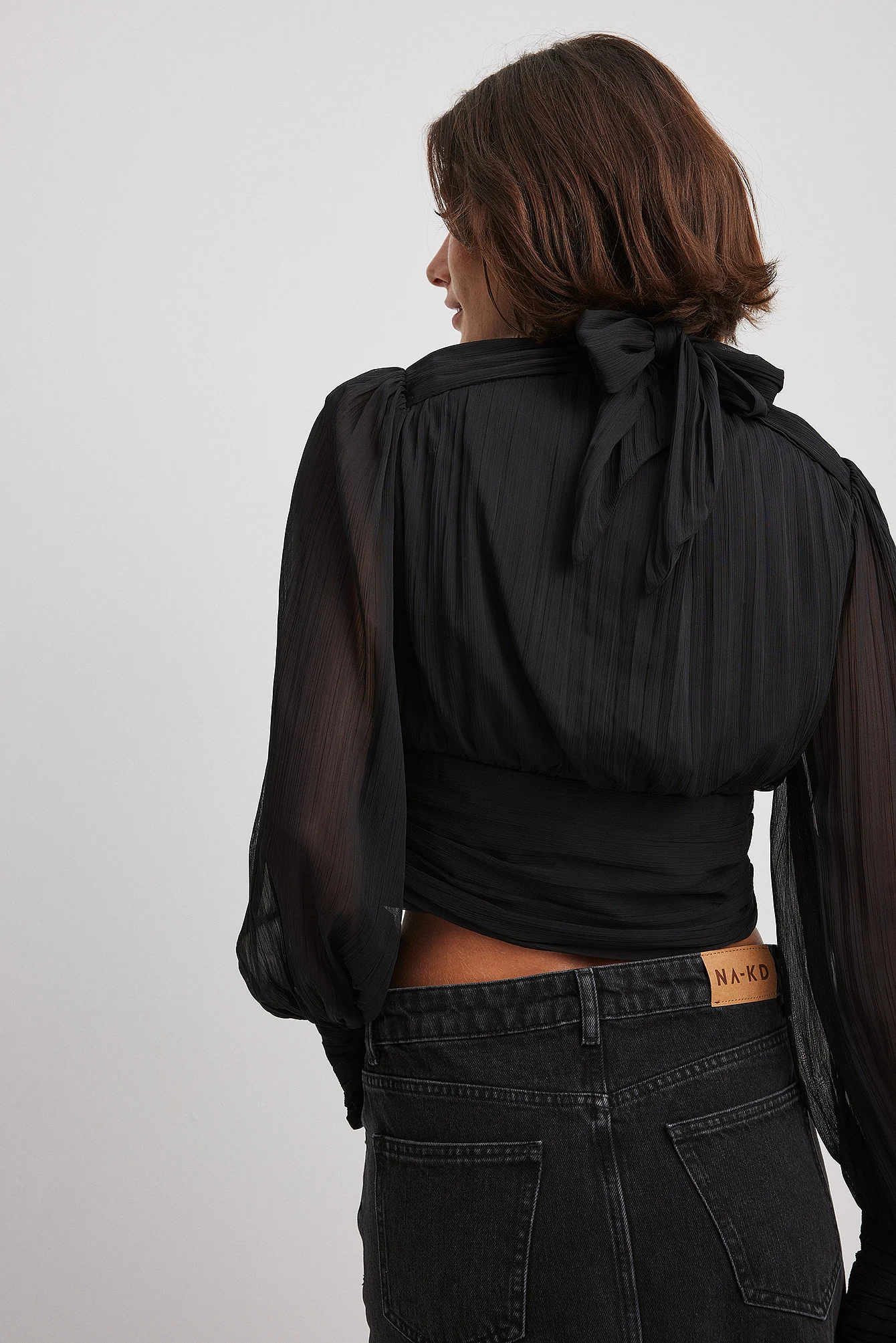 Bluse mit Ballonärmeln und Plissee-Detail