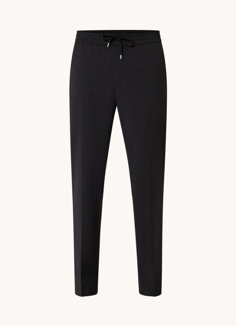 Pantaloni chino Sandro din amestec de lână, cu croială mulată și buzunare laterale.