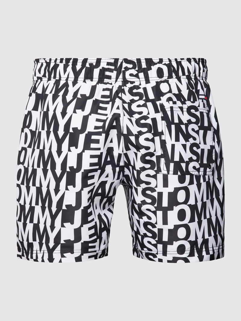 PLUS SIZE Badehose mit Allover-Label-Print in schwarz