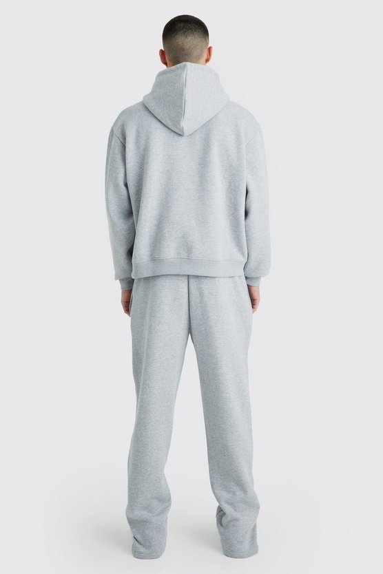 Kastiger Oversize Official Trainingsanzug mit geteiltem Saum