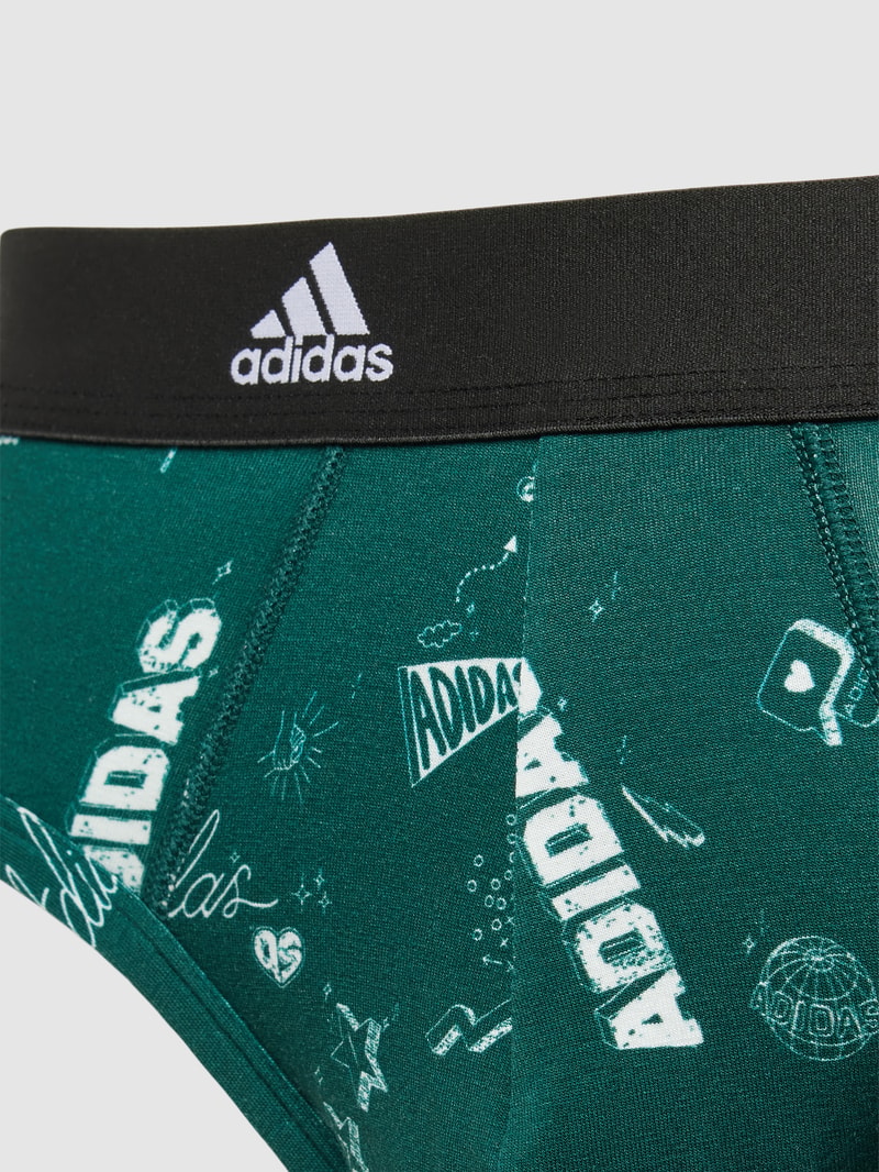 Slip mit Allover-Logo-Muster in grün