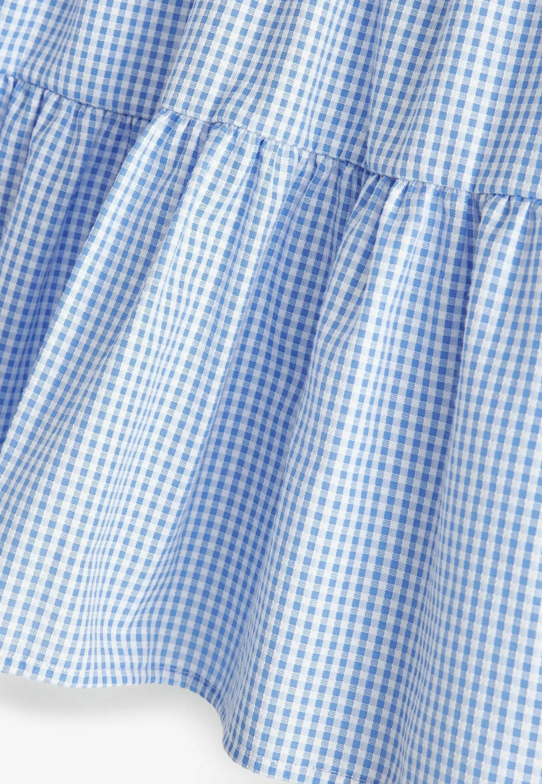Siguiente vestido de verano con estampado de cuadros escalonados de la escuela Rich
